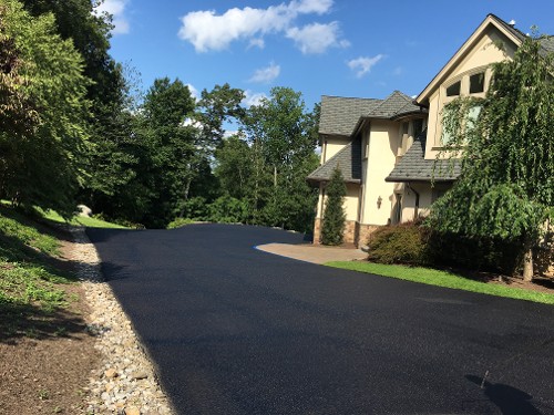 Long Newly Paved Driveway